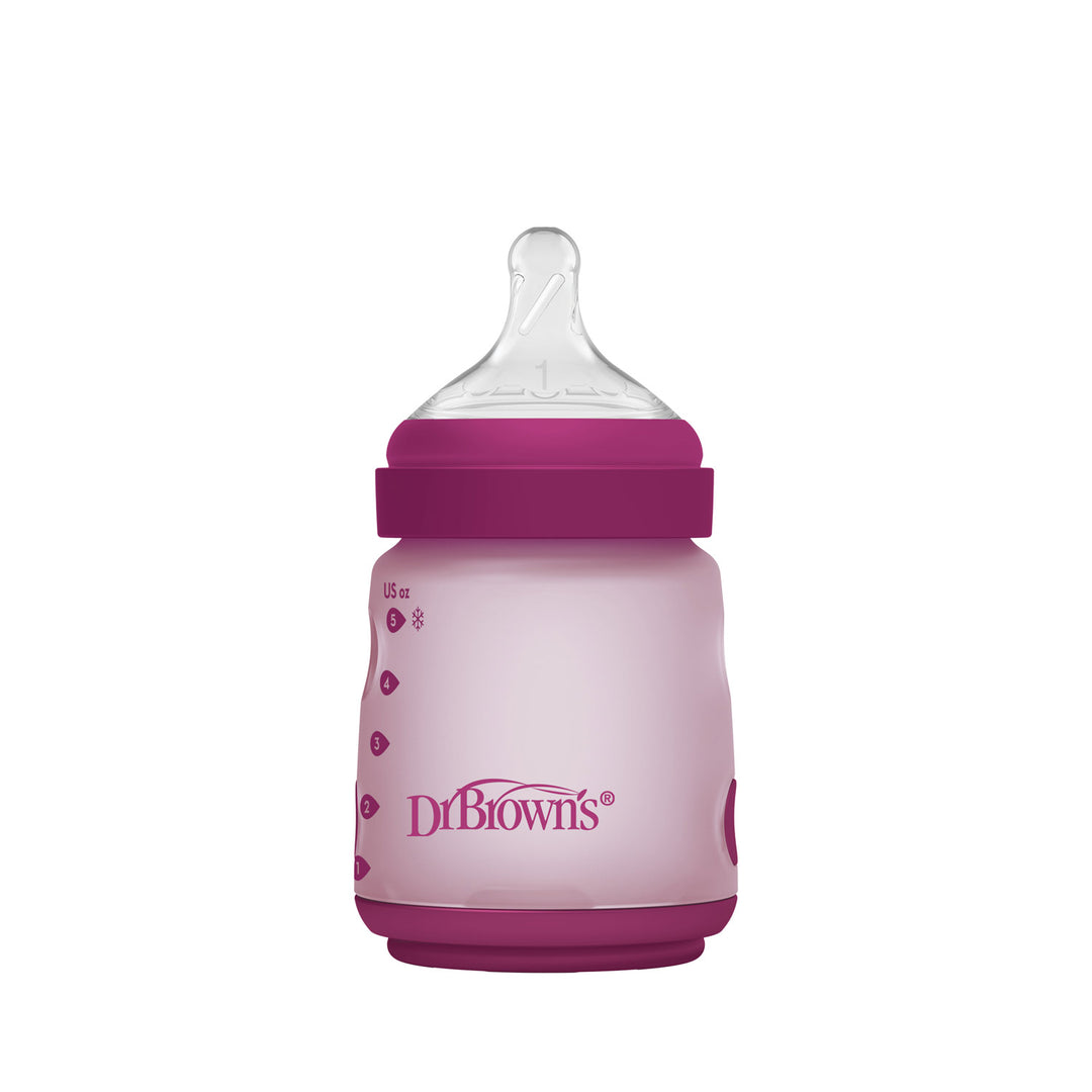 Pink Dr. Brown's silicone wide-neck baby bottle with purple cap