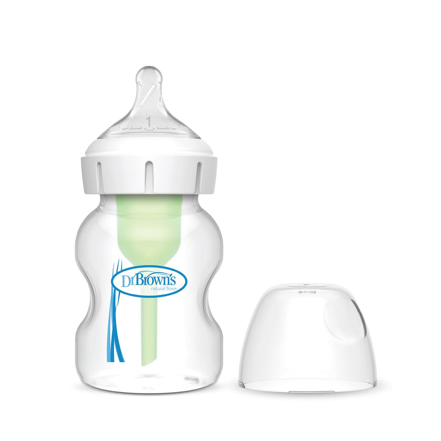A Dr. Brown’s Natural Flow® Anti-Colic Options+™ Wide-Neck Baby Bottle with a Level 1 Slow Flow Nipple stands upright beside its clear cap, providing anti-colic comfort and natural flow on a white background.