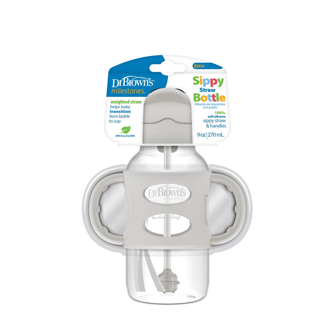 The Dr. Brown’s™ Milestones™ Wide-Neck Sippy Straw Bottle with Silicone Handles, 9 oz/270 mL, is ideal for babies 6 months and older. It includes a silicone weighted straw to aid in independent drinking and transitioning from a bottle, with branded packaging highlighting its features.