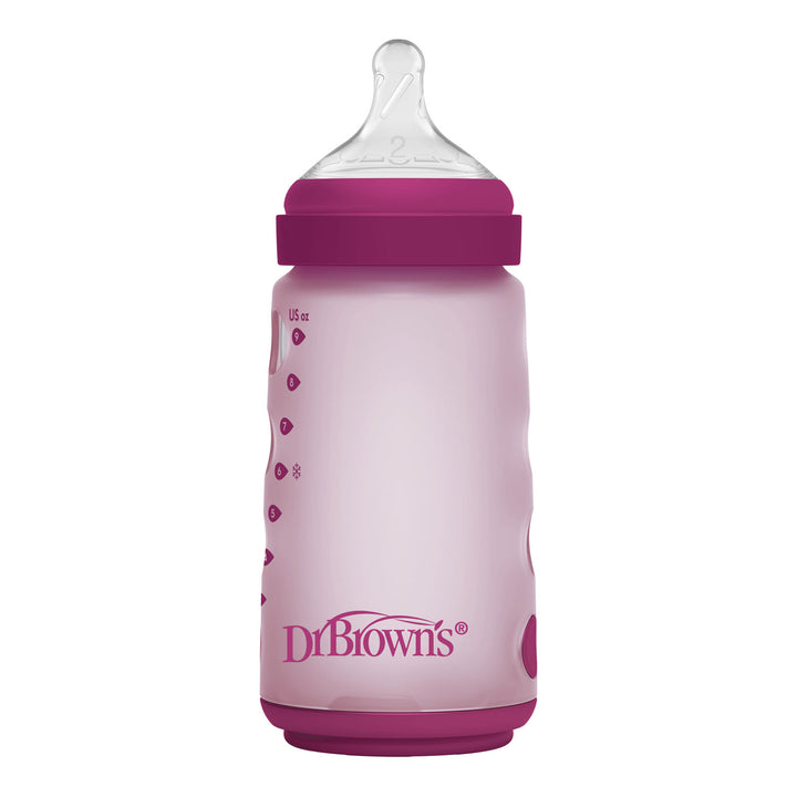 Pink silicone wide-neck baby bottle with pink cap and 'Dr Brown's' logo