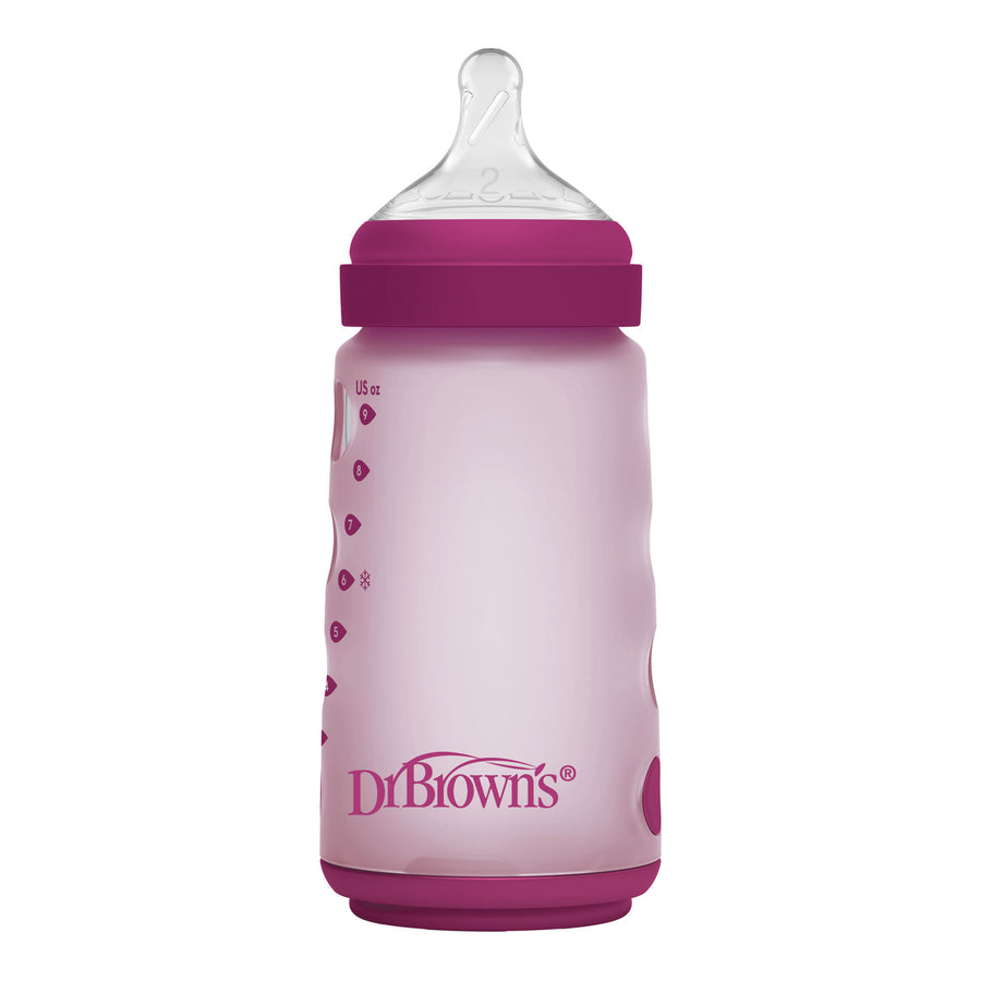 Pink silicone wide-neck baby bottle with pink cap and 'Dr Brown's' logo