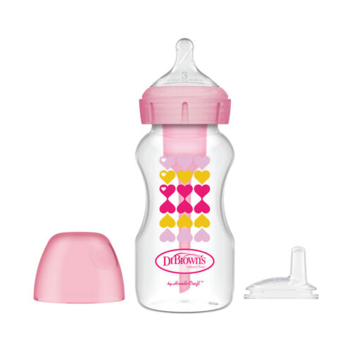 A baby bottle featuring pink and yellow heart designs with a pink cap. The bottle is accompanied by a separate clear nipple and a pink cap cover.