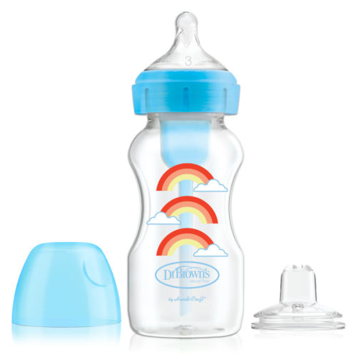 A clear baby bottle with blue accents, featuring a design of three rainbows and clouds. The bottle cap and a silicone nipple are placed next to it.
