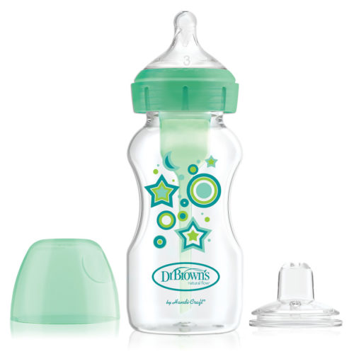 A green-tinted baby bottle with star and circle decorations, featuring a Dr. Brown's brand logo. The bottle has a wide neck and is accompanied by a matching green cap and an additional nipple, placed separately.