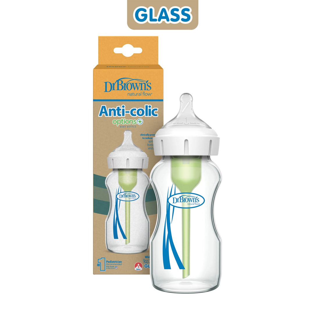 Dr. Brown’s Natural Flow® Anti-Colic Options+™ Wide-Neck Glass Baby Bottle with Level 1 Slow Flow Nipple, shown with white cap, green vent, and packaging labeled “GLASS” and “Anti-colic options+.”.