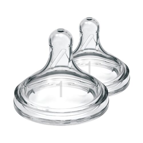 Two transparent baby bottle nipples with a rounded top and a number "1" marked on each. They are positioned side by side on a white background.