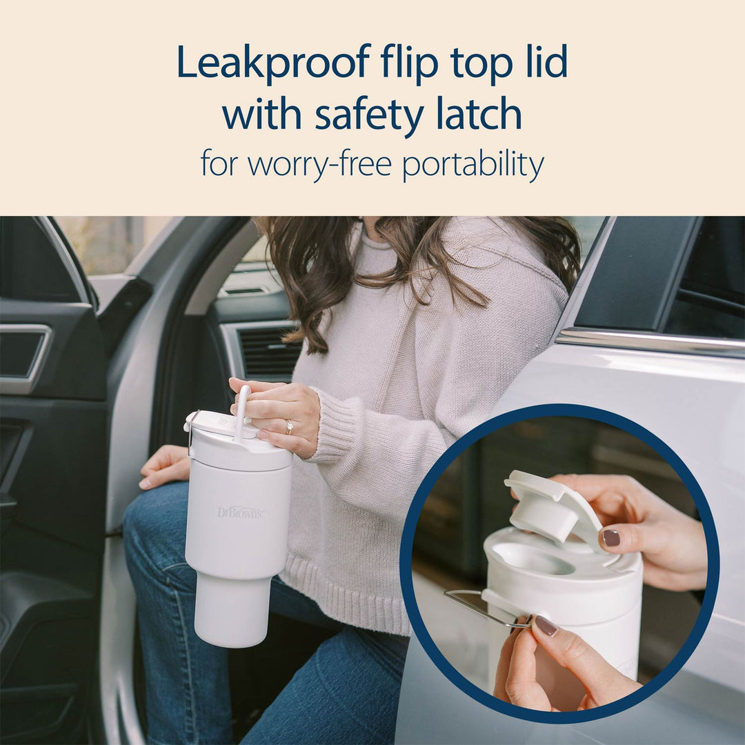 Person using a breast milk and formula chiller with a leakproof flip top lid in a car, emphasizing safety and portability.