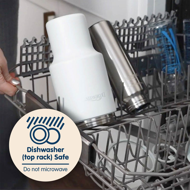 A breast milk and formula chiller being loaded into a dishwasher with a 'Dishwasher Safe' label.