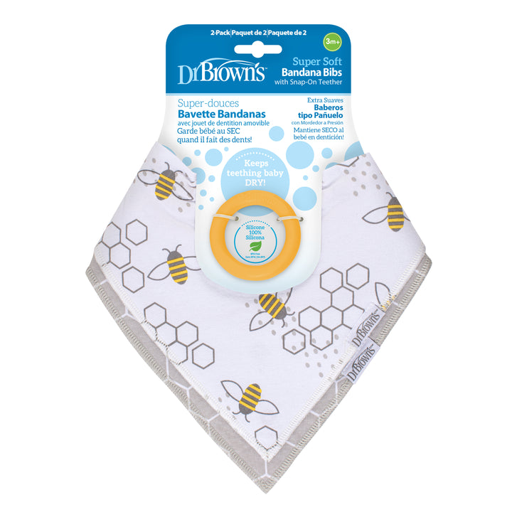 A set of two Dr. Brown’s™ Bandana Bibs with Removable Teether in white, showcasing an adorable honey bee and honeycomb design. The packaging provides information in both English and French, emphasizing the product's advantages.