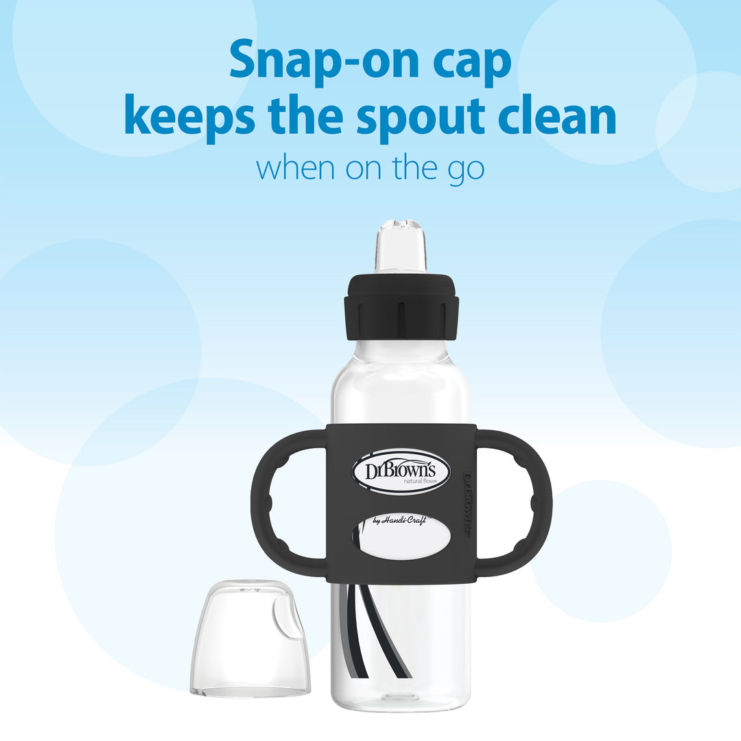 The Dr. Brown’s® Milestones™ Narrow Sippy Spout Bottle with Silicone Handles (8 oz/250 mL) is displayed against a blue backdrop. The text above says, "Snap-on cap keeps the soft silicone spout clean when on the go." The bottle stands upright with its cap placed beside it.