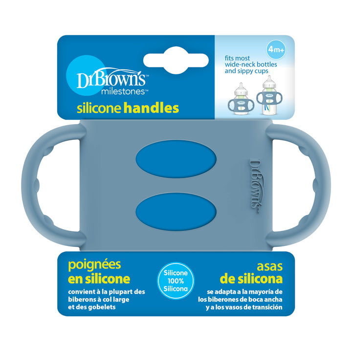 The packaging for Dr. Brown’s® Milestones™ Wide-Neck Silicone Handles in blue is ideal for promoting independent drinking skills with most wide-neck bottles and sippy cups suitable for ages 4 months and up. The text in English, French, and Spanish emphasizes that it is made of 100% silicone.