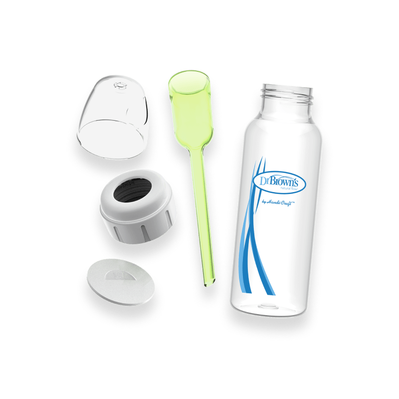 Baby bottle set including a clear bottle, green spoon, white cap, and other detachable parts, displayed on a white background.