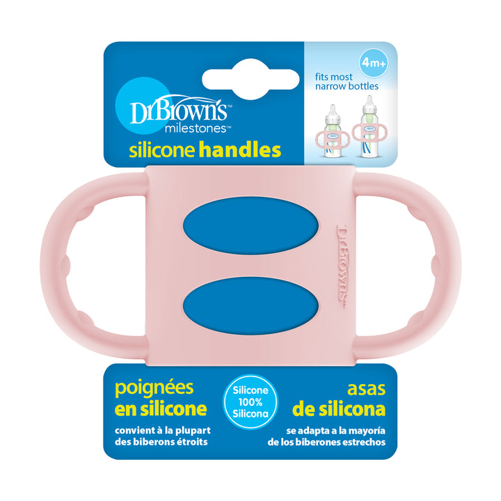 Dr. Brown's® Milestones™ Narrow Silicone Handles, designed for developing independent drinking skills in babies 4 months and older, come in a pink color with blue grip areas. The packaging is available in English, French, and Spanish to ensure inclusivity and wide accessibility.