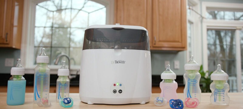 Dr. Brown's Sterilizer on a counter with bottles in a kitchen