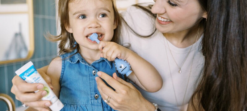 Dr. Brown's Toothbrush and Toothpaste with Mom and daughter.