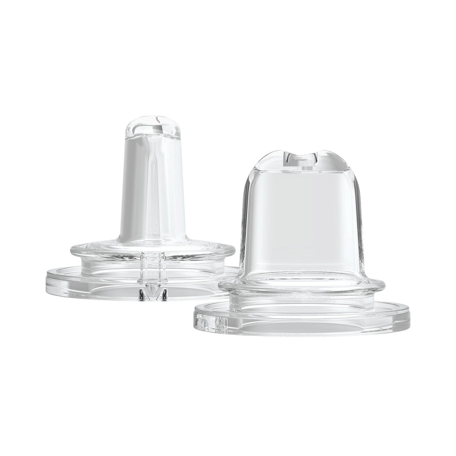 Two Dr. Brown's® Milestones™ Options+™ sippy spouts are displayed side by side on a white background. Made from soft 100% silicone, one is shown with the spout visible from the side and the other from a front angle, highlighting their design for easy drinking.