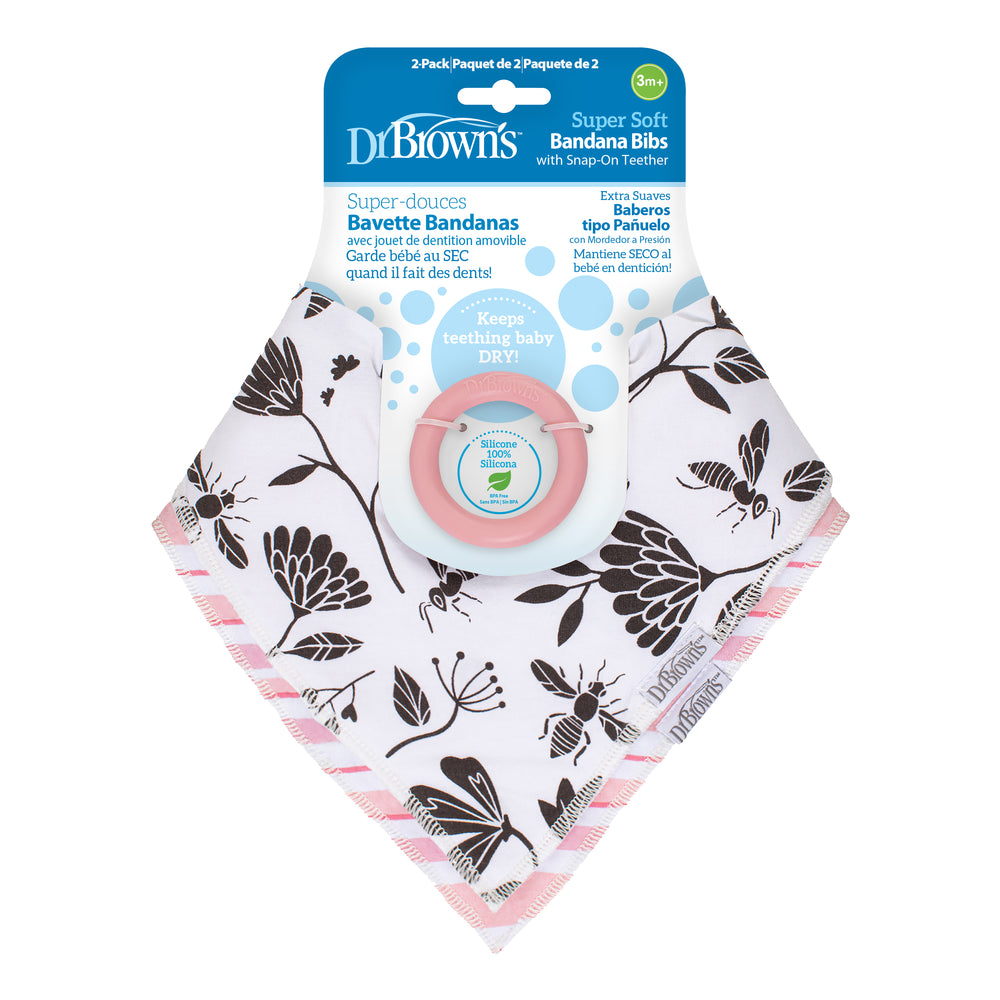 The Dr. Brown's™ Bandana Bibs with Removable Teether packaging features a set of two highly absorbent bandana bibs adorned with a floral design, each accompanied by a pink detachable teether. The vibrant packaging emphasizes the brand's identity and highlights its effectiveness in keeping teething babies dry.