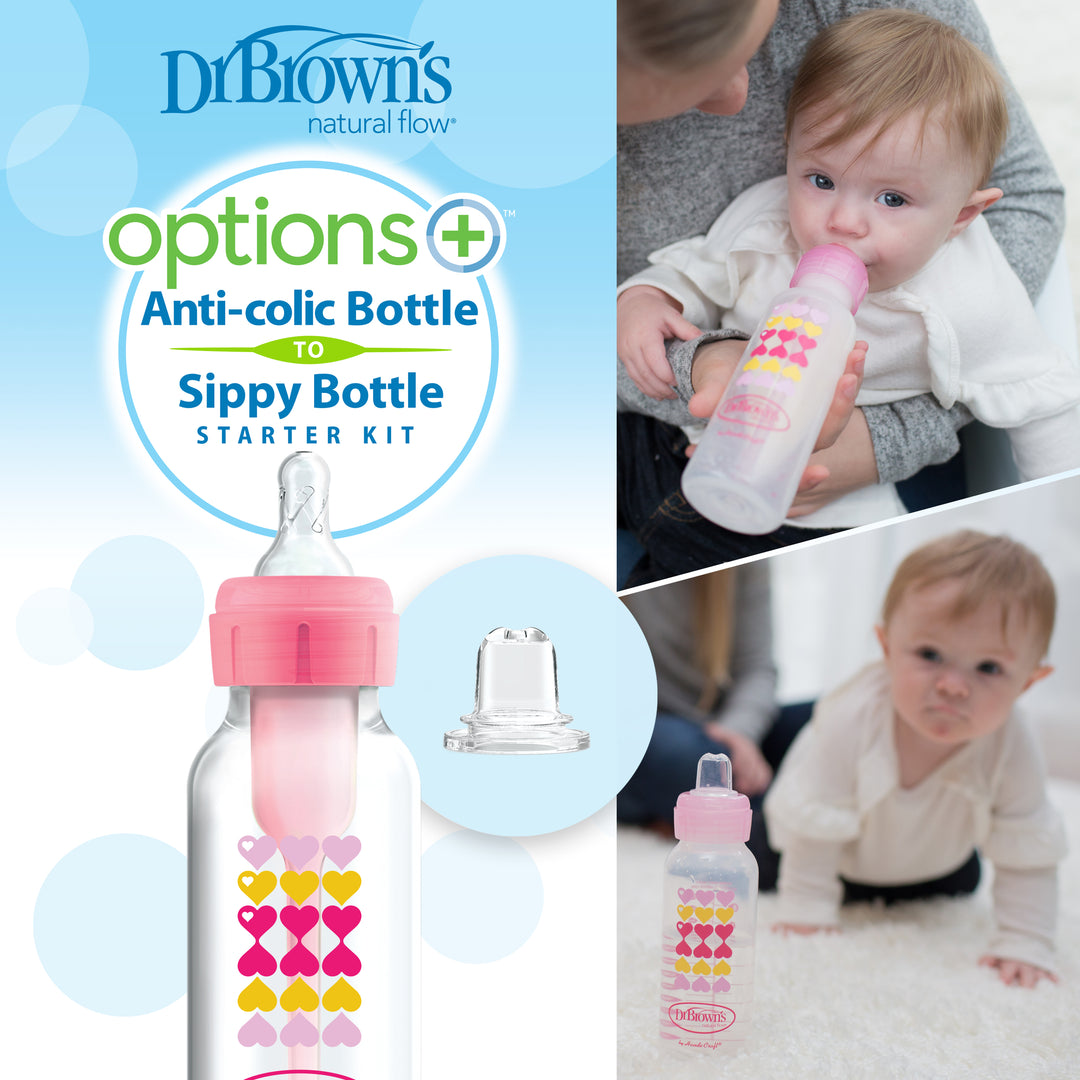 An advertisement for the Dr. Brown's Natural Flow® Anti-Colic Options+™ Narrow Sippy Bottle Starter Kit features a baby happily feeding from a bottle adorned with pink heart designs. This innovative anti-colic system ensures comfort, while the included kit converts it into an ideal sippy bottle starter pack.