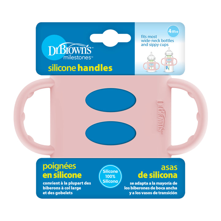 This packaging of Dr. Brown's® Milestones™ Wide-Neck Silicone Handles promotes independent drinking skills for young children. Compatible with wide-neck bottles and sippy cups, the pink handles featuring blue accents are suitable for ages 4 months and older, and include descriptions in both English and French.