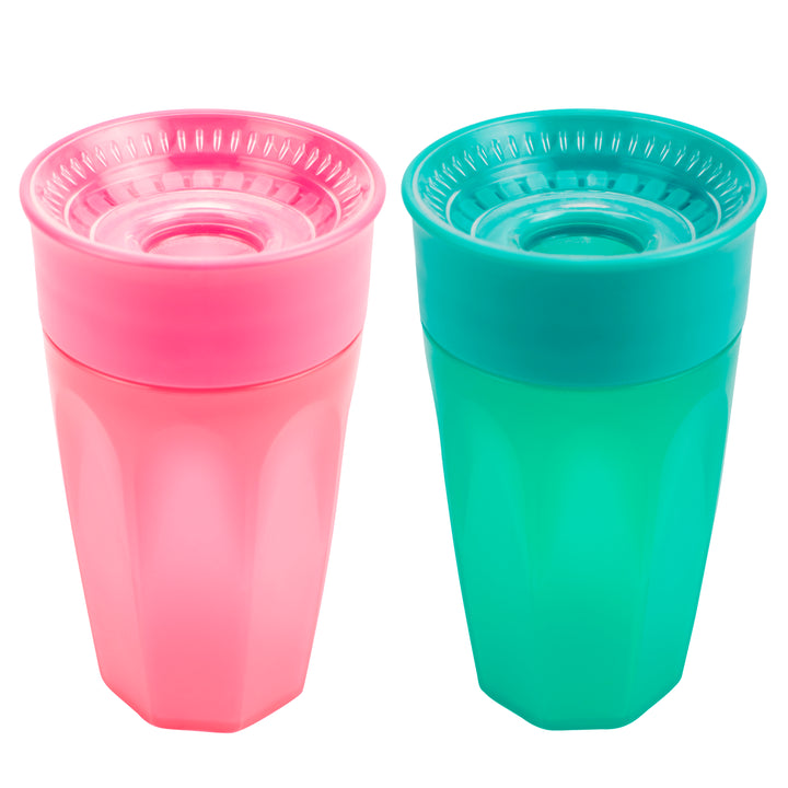 Displayed are two spill-proof cups from Dr. Brown's—one spoutless design in pink on the left and the Dr. Brown’s® Milestones™ Cheers360™ Cup, 10 oz/300 mL, in teal on the right. Both feature textured lids with Sip and See silicone valves to prevent spills, and they stand side by side against a crisp white background, ready for any adventure.