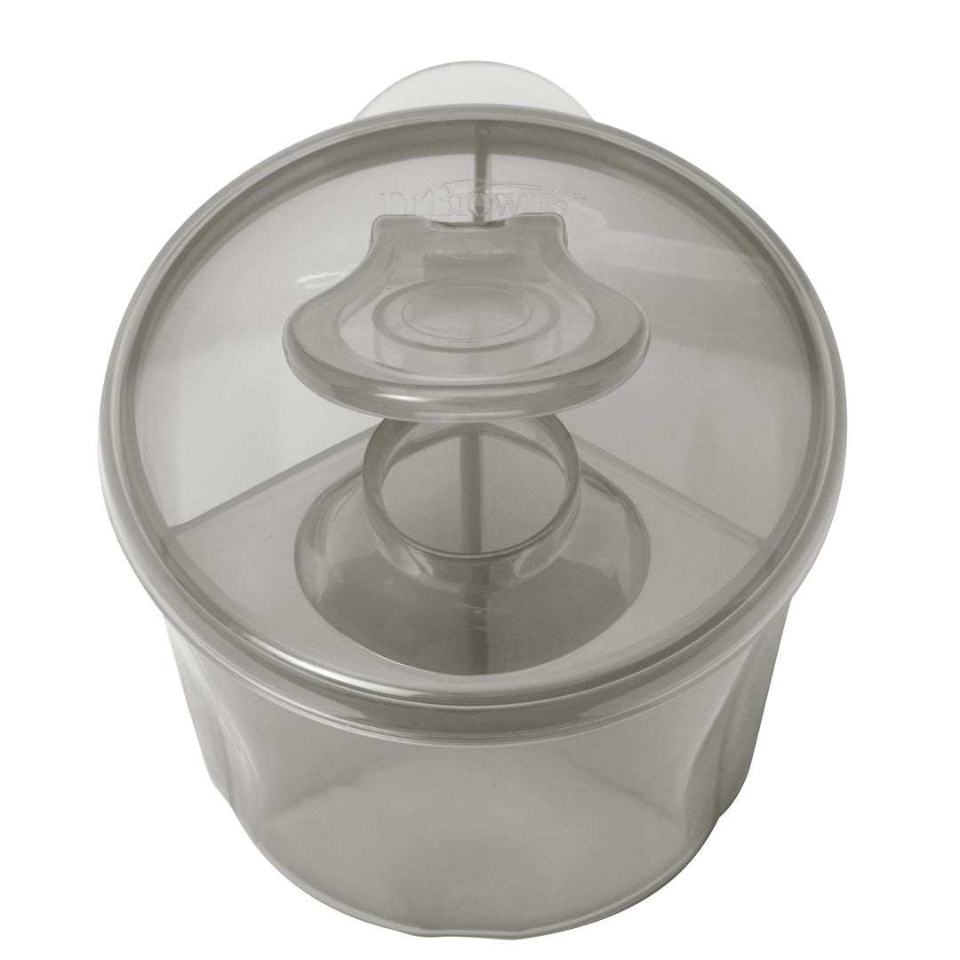 The Dr. Brown's® formula dispenser lid, tailored for a 9 oz baby bottle, has a handle on top and a circular section for a secure fit. As part of the Dr. Brown's feeding or storage system, it is designed to be easily gripped and is likely intended to complement a formula dispenser setup.