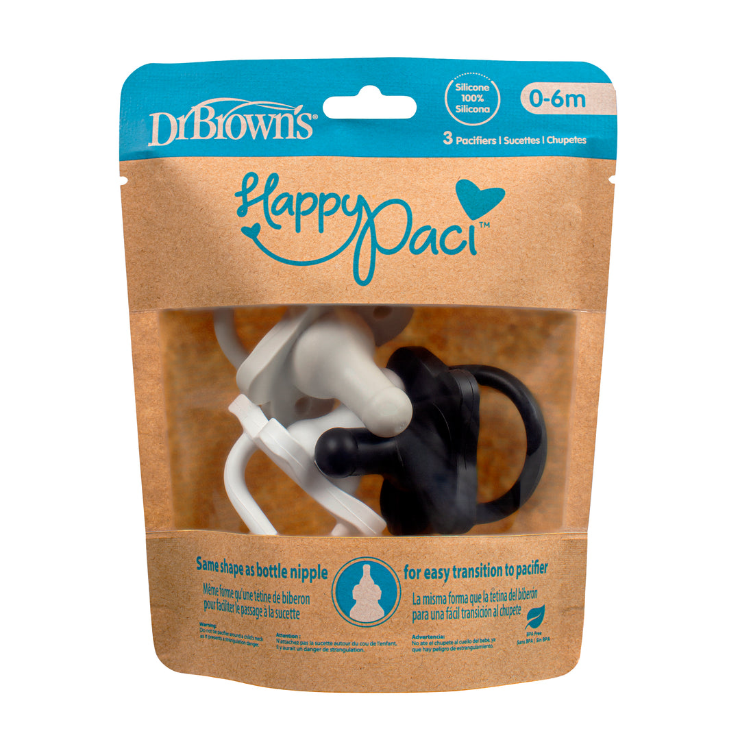 The packaging for Dr. Brown’s® HappyPaci™ 100% Silicone One-Piece Pacifier showcases a trio of pacifiers designed for babies aged 0-6 months. With a brown design accented in blue, the package includes a clear window displaying pacifiers in white, black, and gray, perfectly complementing Dr. Brown's bottle nipple collection.