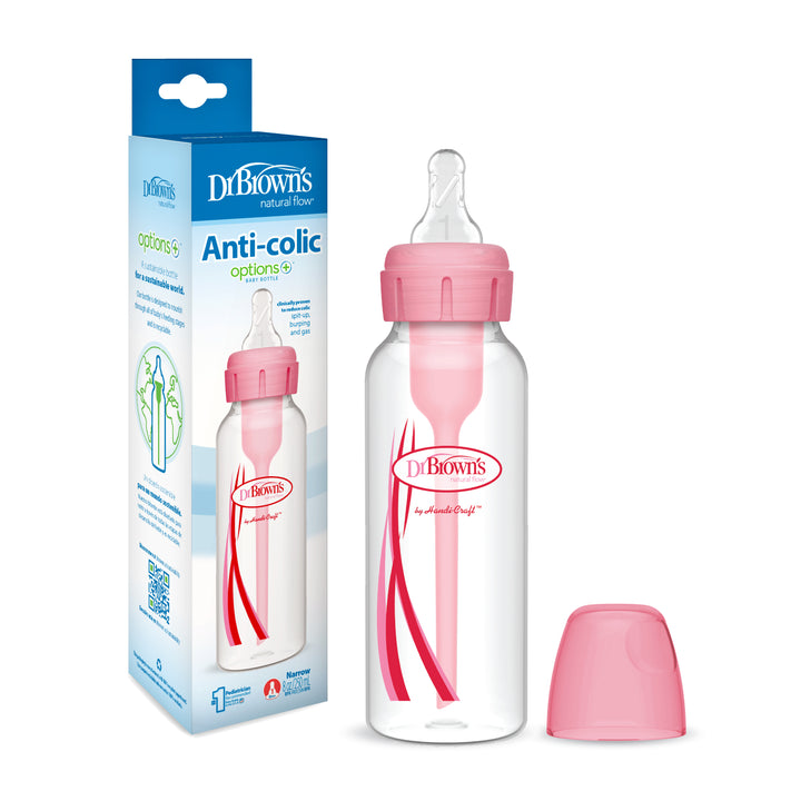 A Dr. Brown’s Natural Flow® Anti-Colic Options+™ Narrow Baby Bottle, featuring a pink Level 1 Slow Flow Nipple, is displayed alongside its packaging box, which highlights its features and benefits through text and graphics.