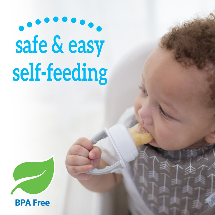 A baby is sitting in a high chair, holding and chewing on a Dr. Brown's™ Fresh Firsts™ Silicone Feeder. The image includes the text "safe & easy self-feeding" and "BPA Free" accompanied by a green leaf icon, emphasizing its advantages for transitioning to solid foods.