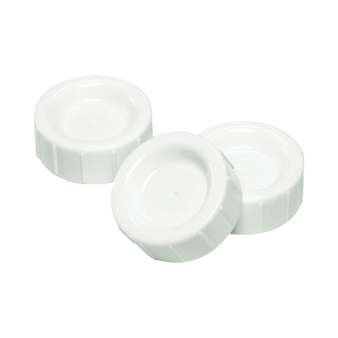 The three caps from Dr. Brown’s Natural Flow® Storage/Travel Caps Narrow 3-Pack are positioned in a slightly overlapping fashion against a plain white background. These round, white plastic caps, designed by Dr. Brown's, feature ridged sides and flat tops, making them ideal for securely sealing bottles during storage or travel.