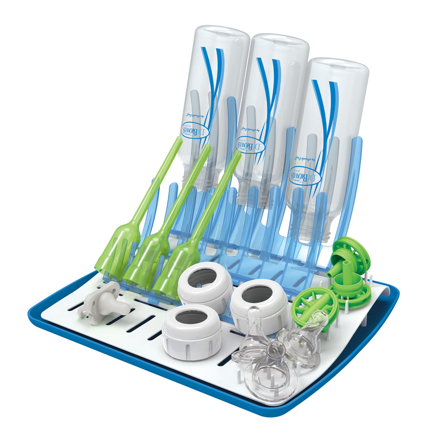 Dr. Brown’s Folding Baby Bottle Drying Rack is perfect for organizing your baby essentials, featuring multiple slots to accommodate four clear Dr. Brown's bottles, green bottle brushes, and various cleaning accessories. This blue and white BPA-free rack efficiently optimizes counter space while keeping everything neatly stored.