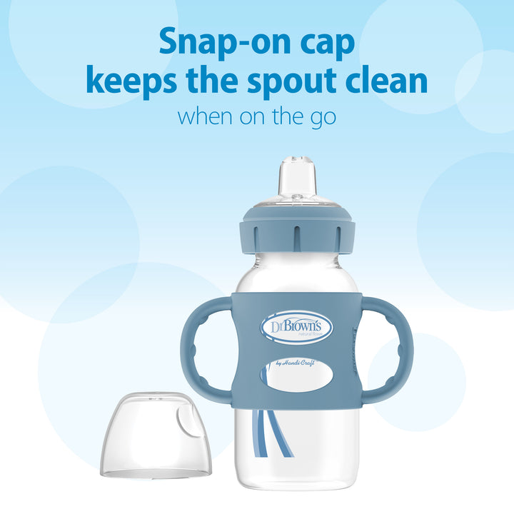 Displayed is the Dr. Brown’s® Milestones™ Wide-Neck Sippy Spout Bottle with Silicone Handles, featuring a snap-on cap that keeps the sippy spout clean when on the go. The transition bottle, showcasing a blue design with twin handles, is complemented by a removable cap set against a blue background.