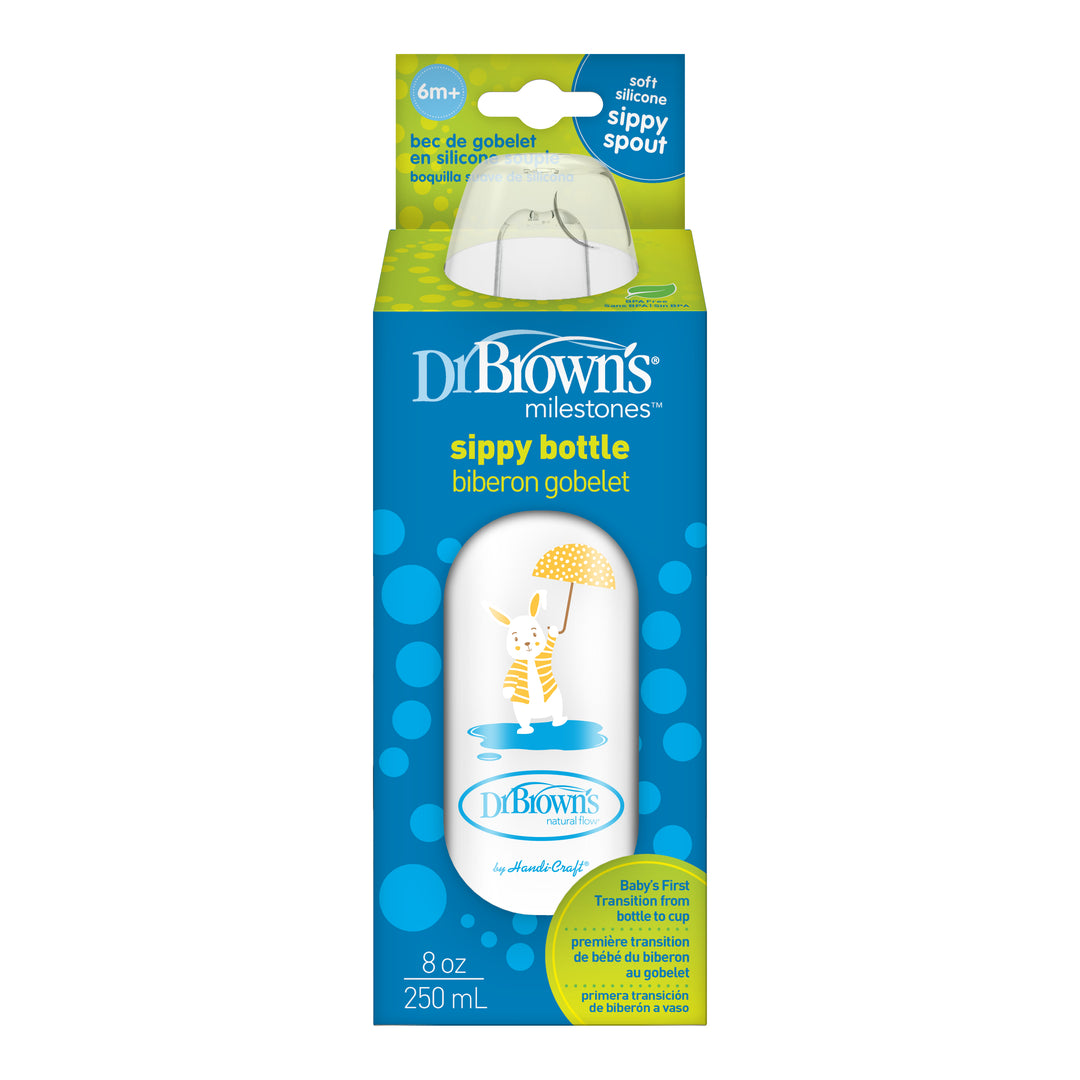 Image of Dr. Brown's® Milestones™ Narrow Sippy Bottle, 8oz/250mL, 6m+ in packaging. The bottle features a soft silicone sippy spout, perfect for transitioning from bottle to cup, is appropriate for babies aged 6 months and older, and showcases a giraffe illustration with a yellow umbrella on the design.