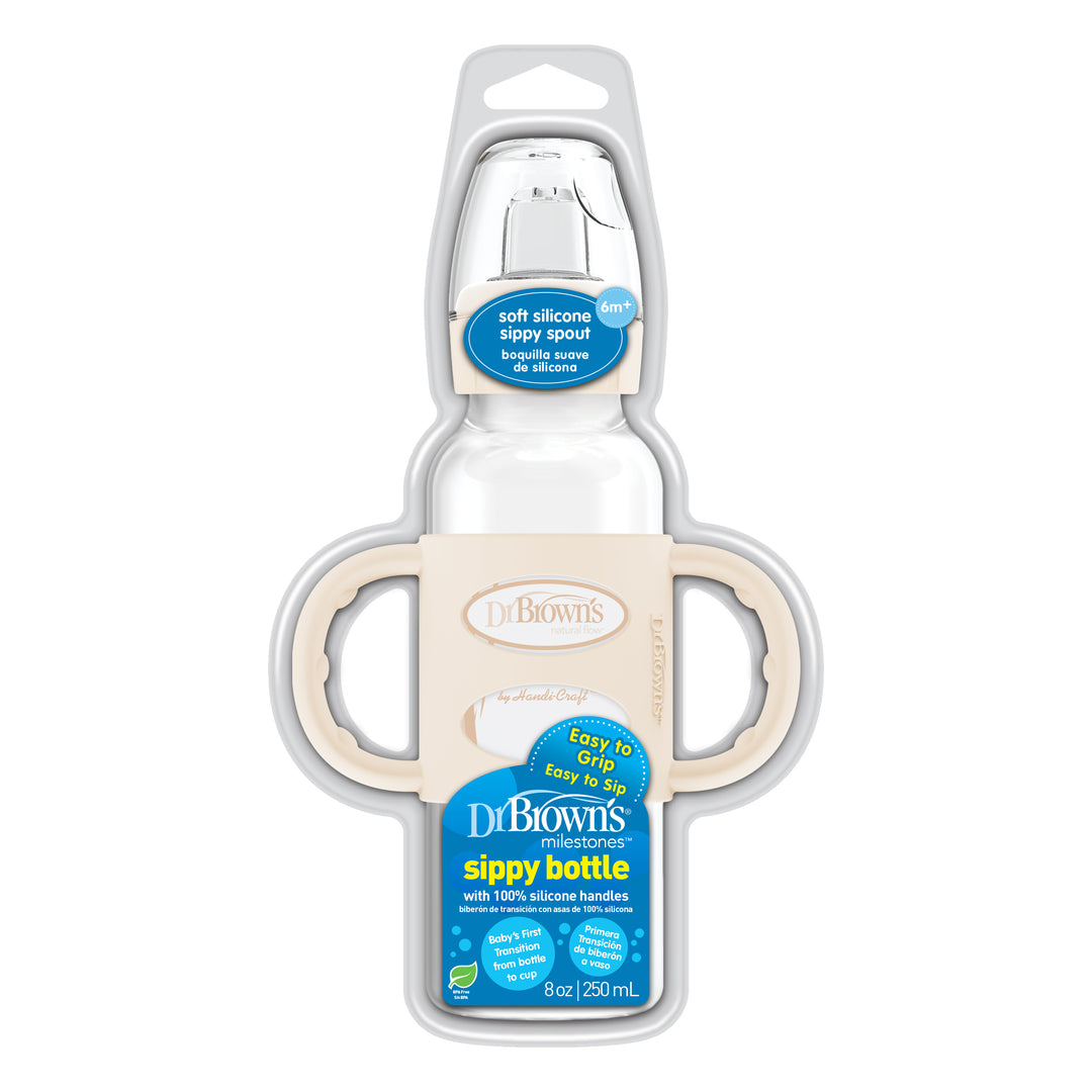 The packaging of Dr. Brown's Milestones Narrow Sippy Spout Bottle features a soft silicone spout and holds 8 oz/250 mL. Designed for an easy transition from bottle to sippy cup, it includes silicone handles for a comfortable grip by little hands.