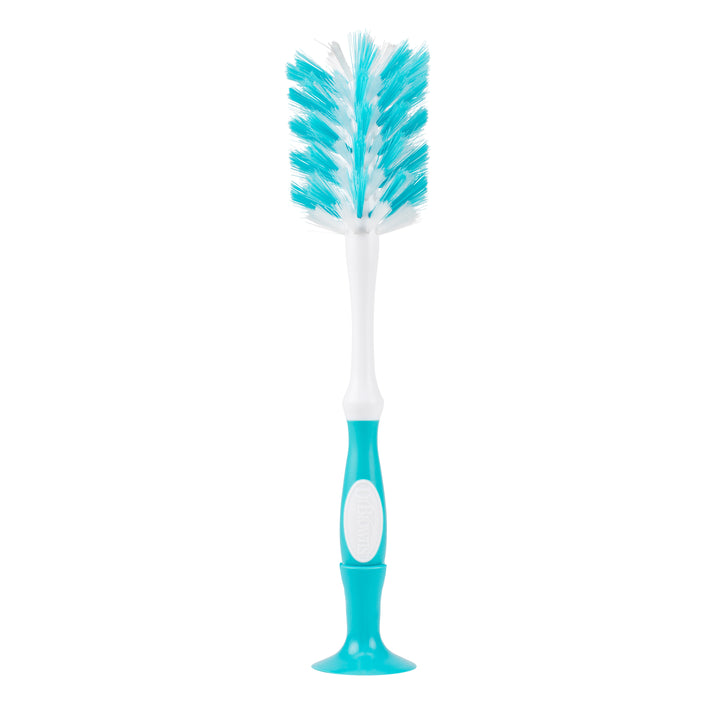 Dr. Brown’s Natural Flow® Deluxe Bottle Brush by Dr. Brown's is BPA-free, featuring a nipple cleaner, blue and white design, long handle with stiff bristles, and a suction base for easy storage.