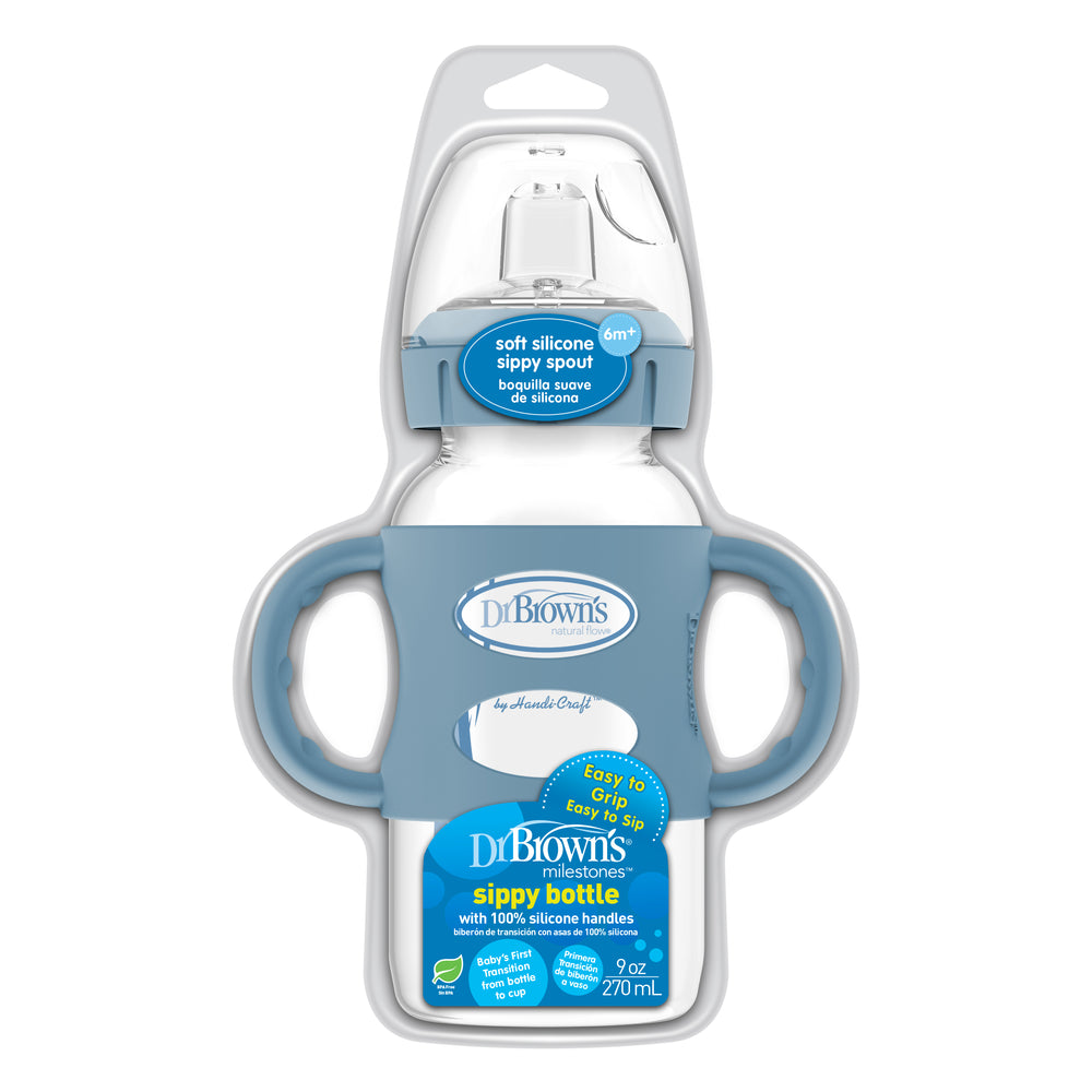 Dr. Brown's Milestones™ Wide-Neck Sippy Spout Bottle features a blue and transparent design, dual silicone handles, and a soft sippy spout. Its packaging emphasizes its user-friendly design for transitioning babies. The bottle has a capacity of 270 ml (9 oz).