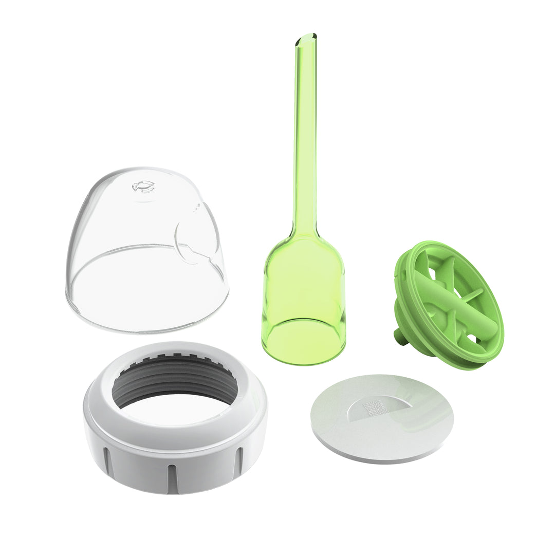 Displayed on a white background is a set of five plastic components from the Dr. Brown’s Natural Flow® Options+™ Wide-Neck Baby Bottle Conversion Kit, 9oz: a clear curved cap, a light green scoop with a tall handle, a white circular ring with gray threading, a small flat white disc, and a green circular lid featuring a cutout pattern.