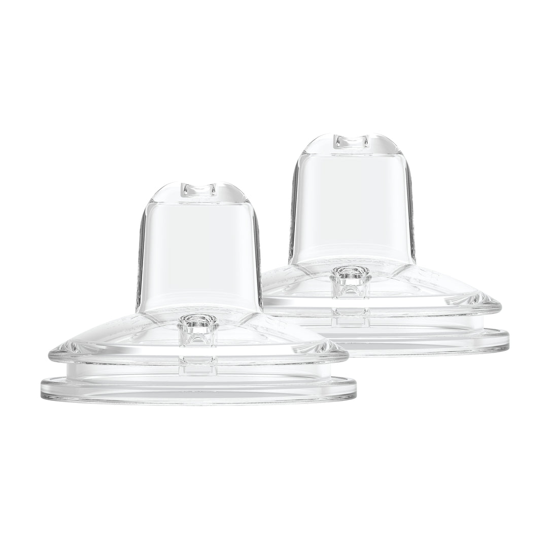 The Dr. Brown's® Milestones™ Options+™ Sippy Spouts 2-Pack, featuring soft, wide-neck, 100% silicone spouts, are shown side by side on a white background. Designed for no-spill convenience and seamless transitions onto your preferred sippy bottles, these spouts are perfect for babies aged 6 months and up.