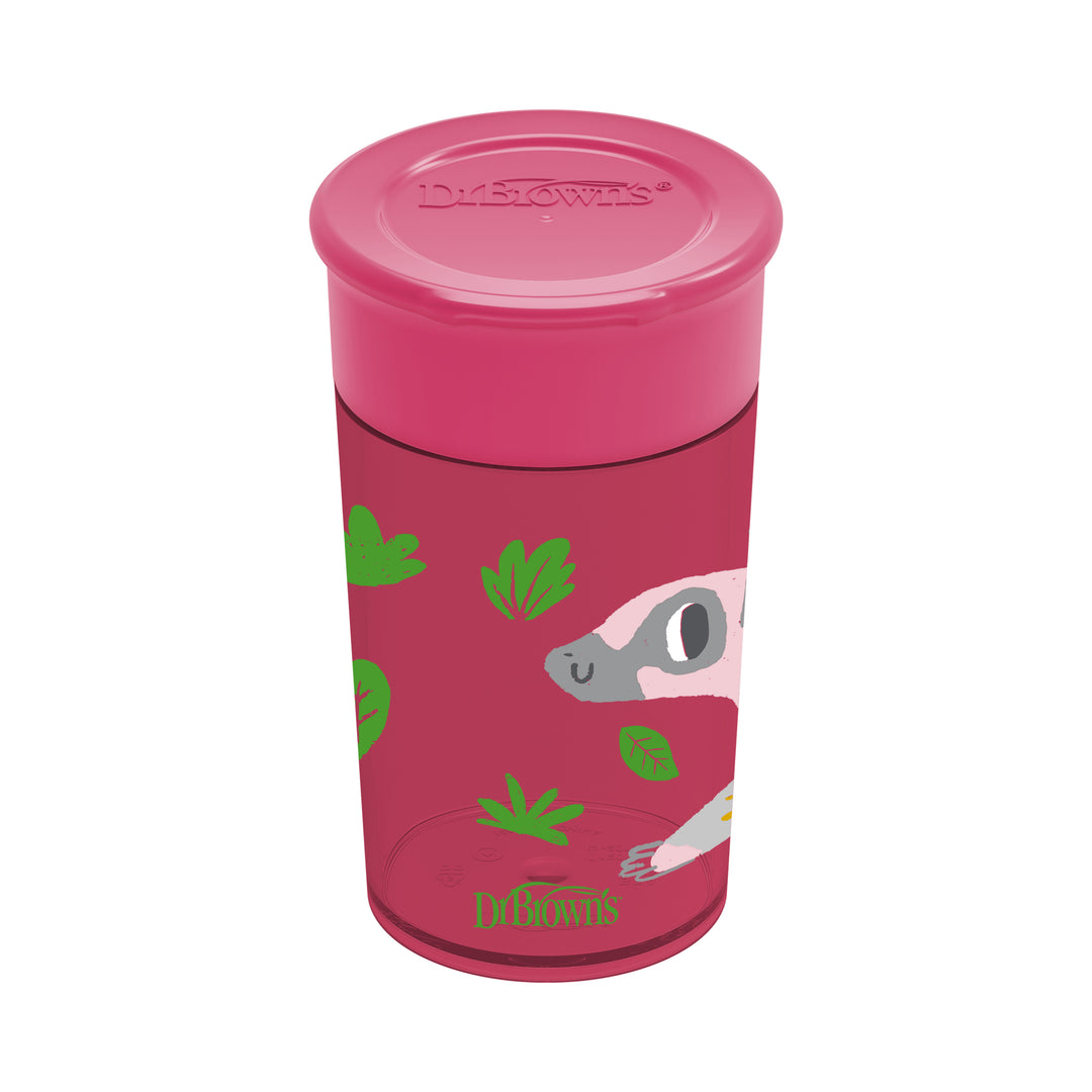 A child-friendly Dr. Brown’s® Milestones™ Cheers360™ Cup in pink, designed as a 360-degree spoutless sippy cup, features a secure lid with an adorable animal illustration and green leaf accents. It's crafted for easy handling and supports leak-free learning.