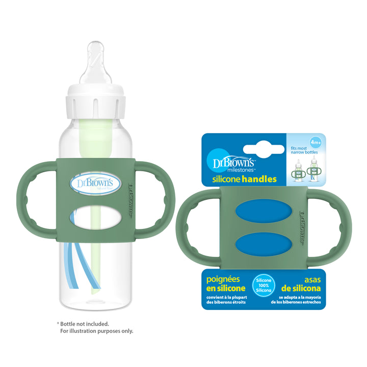 A Dr. Brown’s® Milestones™ Narrow Silicone Handle in green is displayed next to its packaging, which features the Dr. Brown's logo and describes it as a set of silicone handles designed for narrow bottles, ideal for encouraging independent drinking skills during the transition from bottle to cup.