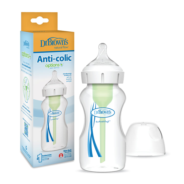 A Dr. Brown’s Natural Flow® Anti-Colic Options+™ Wide-Neck Baby Bottle, featuring a Level 1 Slow Flow Nipple and a green vent system, is showcased beside its blue and white packaging. The packaging emphasizes the Natural Flow features, and the bottle cap is positioned next to the bottle for added convenience and functionality during feeding time.