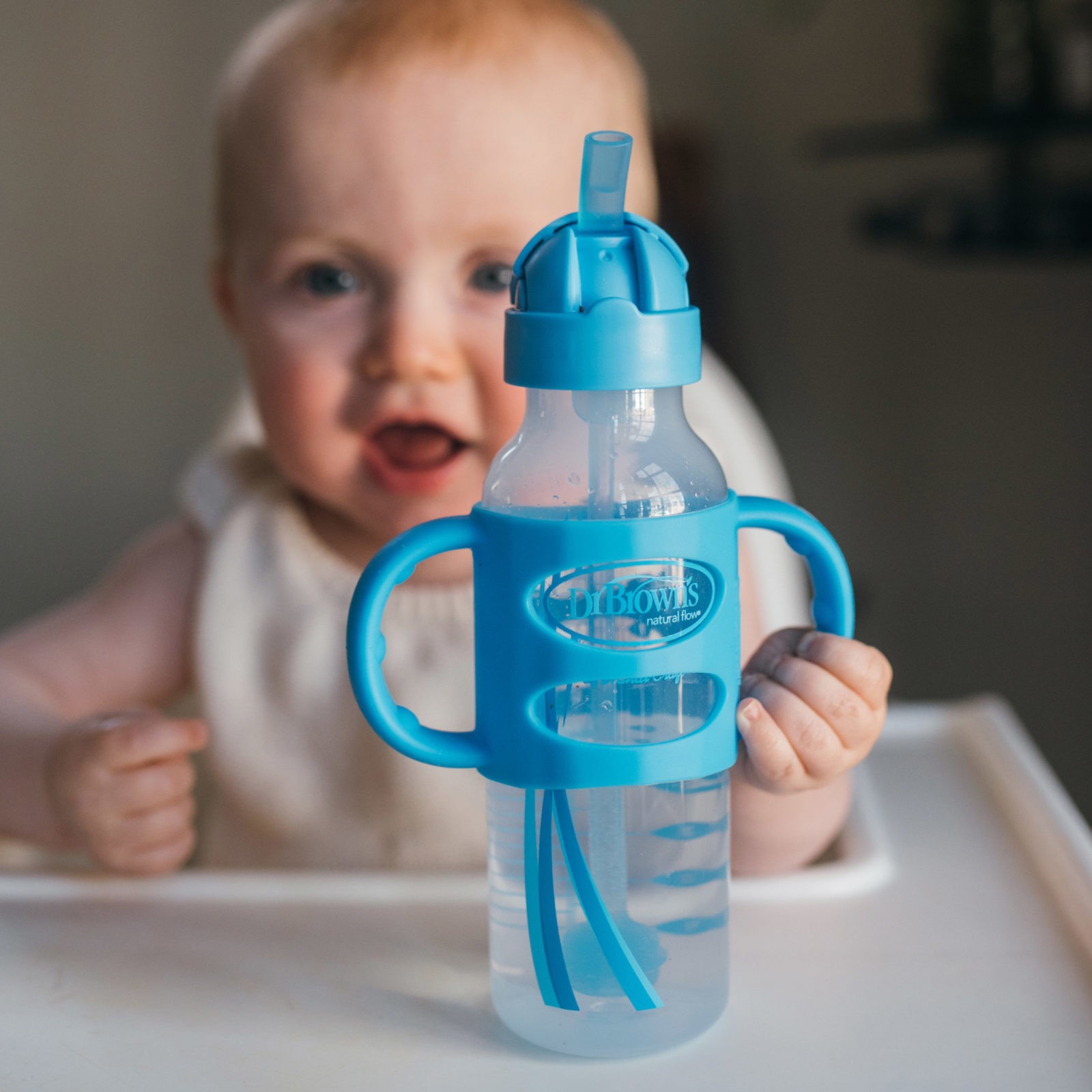 https://www.drbrownsbaby.com/wp-content/uploads/2021/01/Lifestyle_Sippy-Straw-Bottle_Blue_1-scaled.jpg