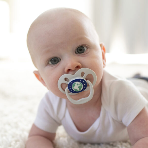 Baby with a Dr. Brown's Advantage pacifier